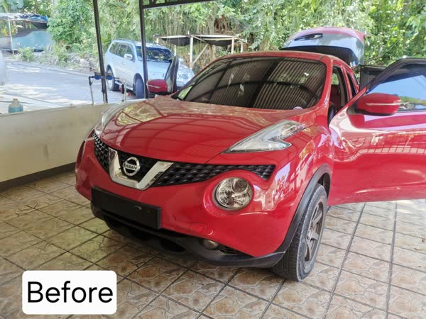 Red Nissan Juke before a JMV home service wash