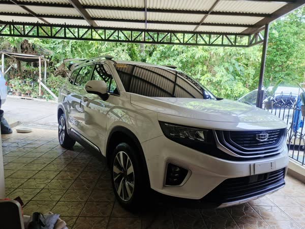 White crossover, JMV home service car wash, Davao City