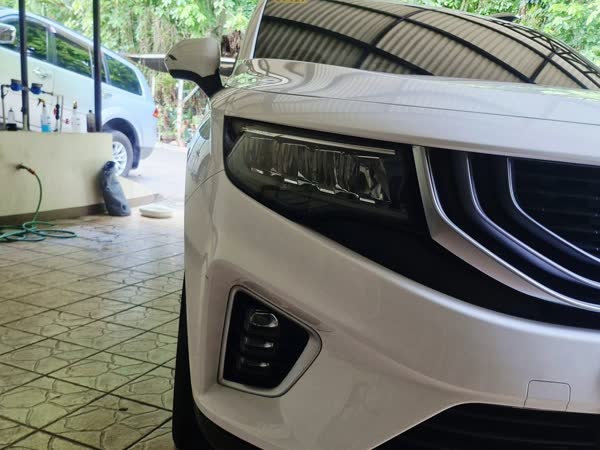 White crossover, JMV home service car wash, Davao City